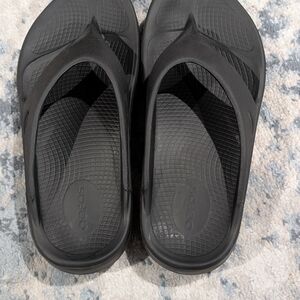 Oofos Black Flip Flops